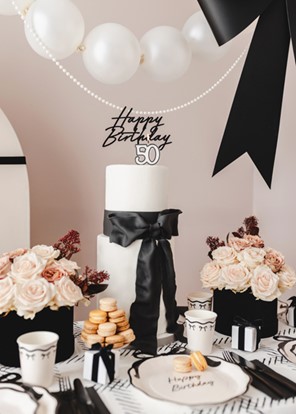 Świeczka cyferka "50" na piku BIAŁA z czarną obwódką